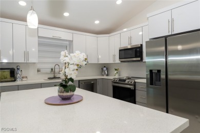Spacious 4BR/2BA Cape Coral home with a private mother-in-law on Burnt Store Golf Club in Florida - for sale on GolfHomes.com, golf home, golf lot
