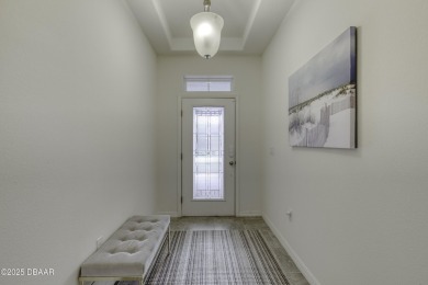 Welcome to this stunning and furnished 4-bedroom, 3-bathroom on LPGA International Golf Course in Florida - for sale on GolfHomes.com, golf home, golf lot