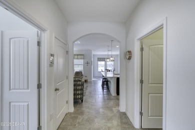 Welcome to this stunning and furnished 4-bedroom, 3-bathroom on LPGA International Golf Course in Florida - for sale on GolfHomes.com, golf home, golf lot