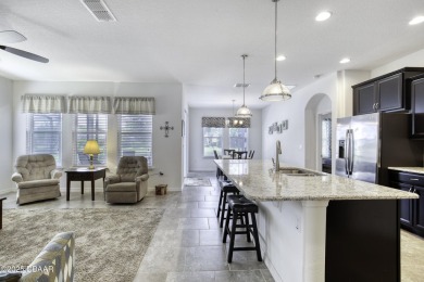 Welcome to this stunning and furnished 4-bedroom, 3-bathroom on LPGA International Golf Course in Florida - for sale on GolfHomes.com, golf home, golf lot