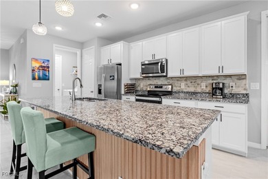 Experience elevated Southwest Florida living in this beautifully on Royal Tee Country Club in Florida - for sale on GolfHomes.com, golf home, golf lot