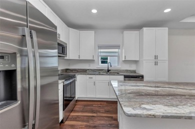 Brand new duplexes MOVE IN READY! Each Unit contains 2 bedrooms on Twin Isles Country Club in Florida - for sale on GolfHomes.com, golf home, golf lot