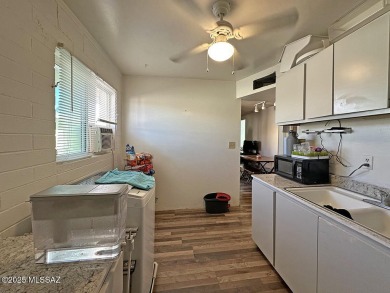 This 2-bedroom, 1-bath upstairs unit in a central Tucson coop on Randolph Park Golf Courses in Arizona - for sale on GolfHomes.com, golf home, golf lot