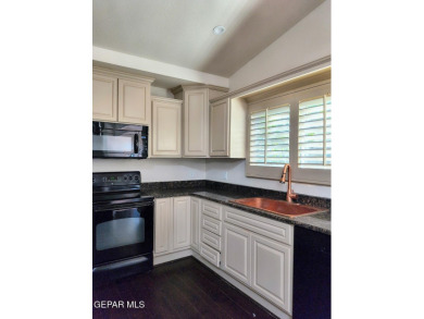Situated in a serene cul-de-sac with a welcoming courtyard, this on Emerald Springs Golf Course in Texas - for sale on GolfHomes.com, golf home, golf lot