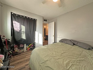 This 2-bedroom, 1-bath upstairs unit in a central Tucson coop on Randolph Park Golf Courses in Arizona - for sale on GolfHomes.com, golf home, golf lot