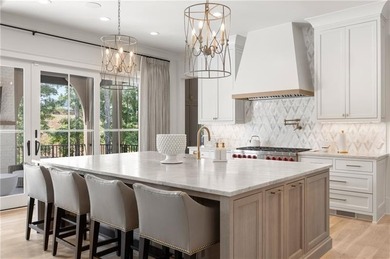 Perfectly situated on a private cul-de-sac, this charming brick on Manor Golf and Country Club in Georgia - for sale on GolfHomes.com, golf home, golf lot