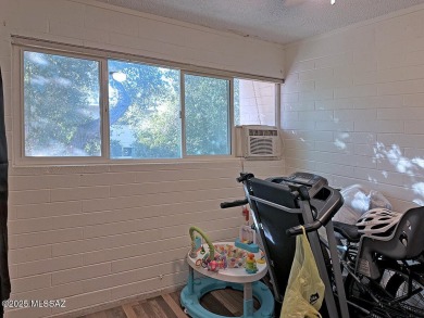 This 2-bedroom, 1-bath upstairs unit in a central Tucson coop on Randolph Park Golf Courses in Arizona - for sale on GolfHomes.com, golf home, golf lot