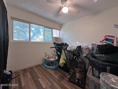 This 2-bedroom, 1-bath upstairs unit in a central Tucson coop on Randolph Park Golf Courses in Arizona - for sale on GolfHomes.com, golf home, golf lot