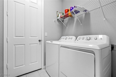 Experience elevated Southwest Florida living in this beautifully on Royal Tee Country Club in Florida - for sale on GolfHomes.com, golf home, golf lot