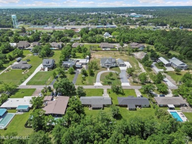 Welcome to laid-back living in beautiful Bay St. Louis! This on The Bridges Golf Club At Hollywood Casino in Mississippi - for sale on GolfHomes.com, golf home, golf lot