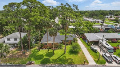 Located in an established neighborhood near the New Smyrna Beach on New Smyrna Beach Golf Course in Florida - for sale on GolfHomes.com, golf home, golf lot