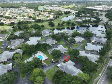 **CLICK ON VIRTUAL TOUR ABOVE** Maintenance FREE Living in the on The Golf Club of Cypress Creek in Florida - for sale on GolfHomes.com, golf home, golf lot