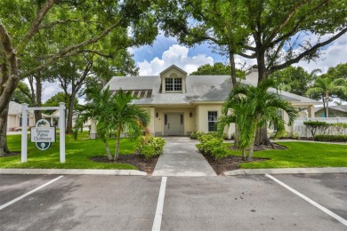 **CLICK ON VIRTUAL TOUR ABOVE** Maintenance FREE Living in the on The Golf Club of Cypress Creek in Florida - for sale on GolfHomes.com, golf home, golf lot