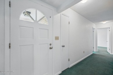 Located in an established neighborhood near the New Smyrna Beach on New Smyrna Beach Golf Course in Florida - for sale on GolfHomes.com, golf home, golf lot