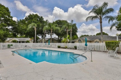 **CLICK ON VIRTUAL TOUR ABOVE** Maintenance FREE Living in the on The Golf Club of Cypress Creek in Florida - for sale on GolfHomes.com, golf home, golf lot