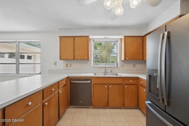 Located in an established neighborhood near the New Smyrna Beach on New Smyrna Beach Golf Course in Florida - for sale on GolfHomes.com, golf home, golf lot