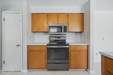 Located in an established neighborhood near the New Smyrna Beach on New Smyrna Beach Golf Course in Florida - for sale on GolfHomes.com, golf home, golf lot
