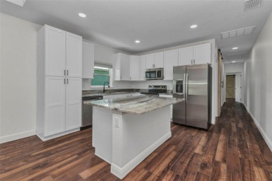 Brand new duplexes MOVE IN READY! Each Unit contains 2 bedrooms on Twin Isles Country Club in Florida - for sale on GolfHomes.com, golf home, golf lot