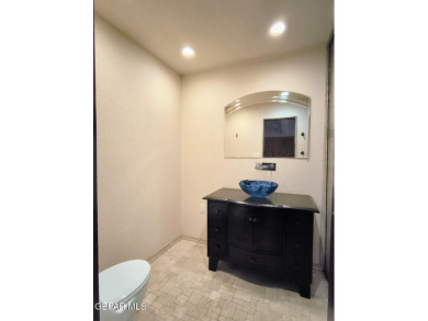 Situated in a serene cul-de-sac with a welcoming courtyard, this on Emerald Springs Golf Course in Texas - for sale on GolfHomes.com, golf home, golf lot