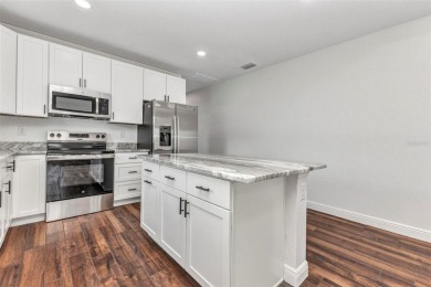 Brand new duplexes MOVE IN READY! Each Unit contains 2 bedrooms on Twin Isles Country Club in Florida - for sale on GolfHomes.com, golf home, golf lot
