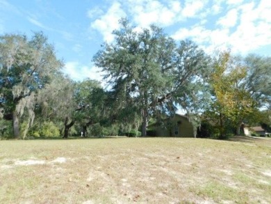 BEAUTIFUL WOODED BUILDING SITE!  This parcel is approximately .4 on The Ridge Manor Oaks Golf and Country Club in Florida - for sale on GolfHomes.com, golf home, golf lot