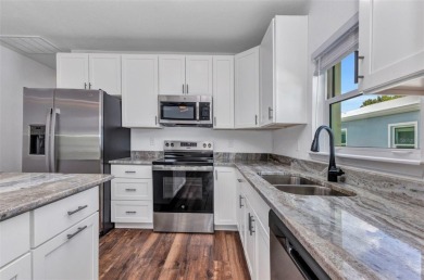 Brand new duplexes MOVE IN READY! Each Unit contains 2 bedrooms on Twin Isles Country Club in Florida - for sale on GolfHomes.com, golf home, golf lot
