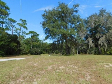 BEAUTIFUL WOODED BUILDING SITE!  This parcel is approximately .4 on The Ridge Manor Oaks Golf and Country Club in Florida - for sale on GolfHomes.com, golf home, golf lot