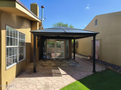 Situated in a serene cul-de-sac with a welcoming courtyard, this on Emerald Springs Golf Course in Texas - for sale on GolfHomes.com, golf home, golf lot