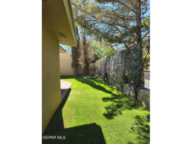 Situated in a serene cul-de-sac with a welcoming courtyard, this on Emerald Springs Golf Course in Texas - for sale on GolfHomes.com, golf home, golf lot