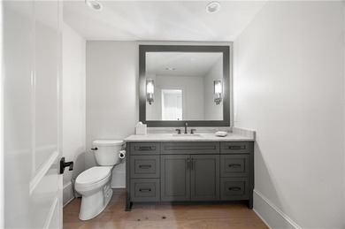 Perfectly situated on a private cul-de-sac, this charming brick on Manor Golf and Country Club in Georgia - for sale on GolfHomes.com, golf home, golf lot