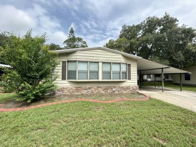 Spacious 2-bed, 2-bath home located just steps from the pool and on Fairways Country Club in Florida - for sale on GolfHomes.com, golf home, golf lot