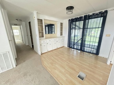 Spacious 2-bed, 2-bath home located just steps from the pool and on Fairways Country Club in Florida - for sale on GolfHomes.com, golf home, golf lot