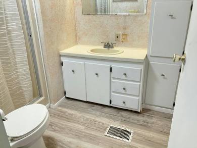 Spacious 2-bed, 2-bath home located just steps from the pool and on Fairways Country Club in Florida - for sale on GolfHomes.com, golf home, golf lot