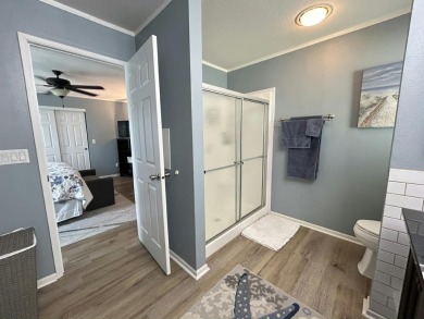 Like-new 2-bedroom, 2-bathroom home in a peaceful 55+ community on Fairways Country Club in Florida - for sale on GolfHomes.com, golf home, golf lot