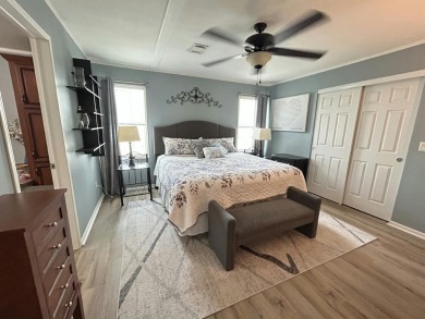 Like-new 2-bedroom, 2-bathroom home in a peaceful 55+ community on Fairways Country Club in Florida - for sale on GolfHomes.com, golf home, golf lot