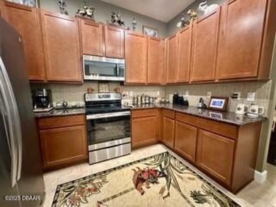 RARE FIND is this larger 2 story, maintenance free Townhome in on Plantation Bay Golf and Country Club in Florida - for sale on GolfHomes.com, golf home, golf lot