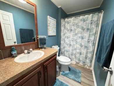 Like-new 2-bedroom, 2-bathroom home in a peaceful 55+ community on Fairways Country Club in Florida - for sale on GolfHomes.com, golf home, golf lot