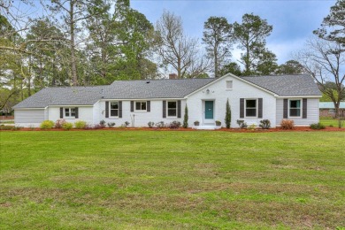 Enjoy quiet, small town living in this lovely 3BR, 2 bath 2144 on Ogeechee Valley Country Club in Georgia - for sale on GolfHomes.com, golf home, golf lot