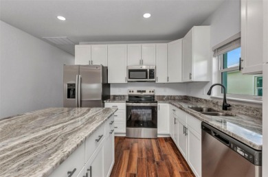 Brand new duplexes MOVE IN READY! Each Unit contains 2 bedrooms on Twin Isles Country Club in Florida - for sale on GolfHomes.com, golf home, golf lot