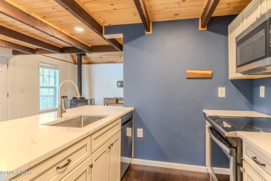 Tucked away in the serene heart of the Lake Wallenpaupack region on Paupack Hills Golf and Country Club in Pennsylvania - for sale on GolfHomes.com, golf home, golf lot