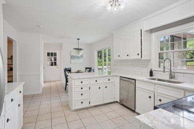 Full-brick, two-story home located on the 13th hole of one of on Raintree Country Club in North Carolina - for sale on GolfHomes.com, golf home, golf lot