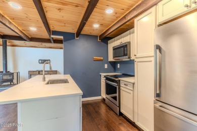 Tucked away in the serene heart of the Lake Wallenpaupack region on Paupack Hills Golf and Country Club in Pennsylvania - for sale on GolfHomes.com, golf home, golf lot