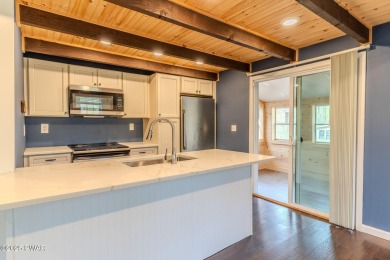 Tucked away in the serene heart of the Lake Wallenpaupack region on Paupack Hills Golf and Country Club in Pennsylvania - for sale on GolfHomes.com, golf home, golf lot