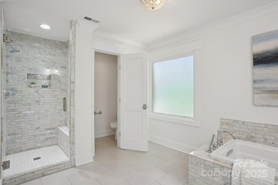 Full-brick, two-story home located on the 13th hole of one of on Raintree Country Club in North Carolina - for sale on GolfHomes.com, golf home, golf lot