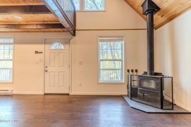 Tucked away in the serene heart of the Lake Wallenpaupack region on Paupack Hills Golf and Country Club in Pennsylvania - for sale on GolfHomes.com, golf home, golf lot