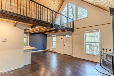 Tucked away in the serene heart of the Lake Wallenpaupack region on Paupack Hills Golf and Country Club in Pennsylvania - for sale on GolfHomes.com, golf home, golf lot