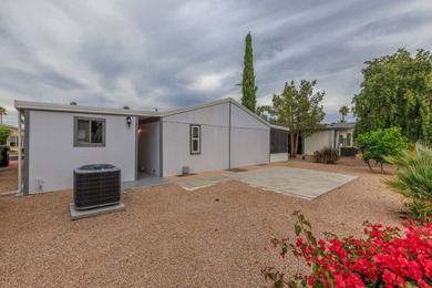 Welcome home to this beautifully maintained 2-bedroom, 2-bath on Painted Mountain Golf Club in Arizona - for sale on GolfHomes.com, golf home, golf lot