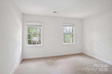 Full-brick, two-story home located on the 13th hole of one of on Raintree Country Club in North Carolina - for sale on GolfHomes.com, golf home, golf lot