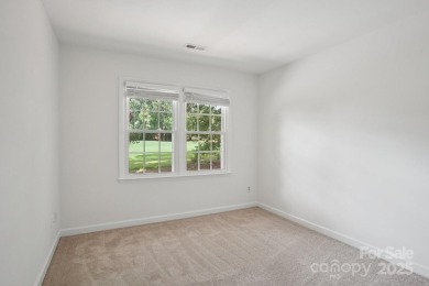 Full-brick, two-story home located on the 13th hole of one of on Raintree Country Club in North Carolina - for sale on GolfHomes.com, golf home, golf lot