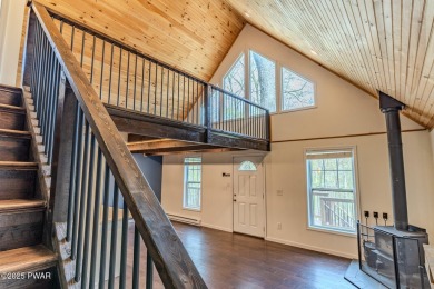 Tucked away in the serene heart of the Lake Wallenpaupack region on Paupack Hills Golf and Country Club in Pennsylvania - for sale on GolfHomes.com, golf home, golf lot